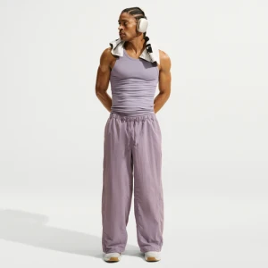 Męskie spodnie Nike z tkaniny o kroju oversize N.A.C. Dri-FIT - Fiolet
