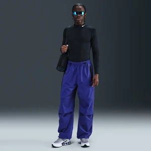 Zdjęcie produktu Męskie spodnie oversize z tkaniny Nike Tech - Fiolet