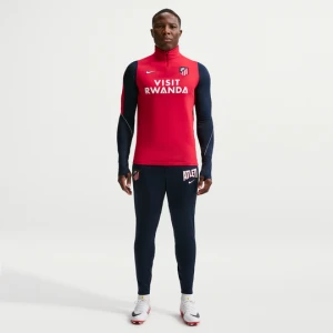 Męskie spodnie piłkarskie z dzianiny Nike Dri-FIT Atlético Madryt Strike (wersja trzecia) - Niebieski