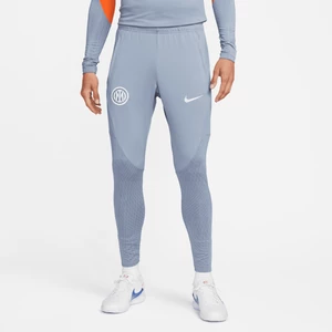 Męskie spodnie piłkarskie z dzianiny Nike Dri-FIT Inter Mediolan Strike (wersja trzecia) - Niebieski