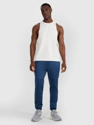 Męskie spodnie treningowe 4F 4FWAW25TFTRM0888 - granatowe