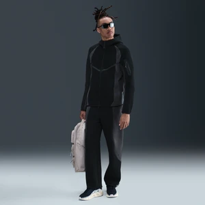 Męskie spodnie z dzianiny w kontrastowych kolorach z luźnymi nogawkami Nike Tech - Czerń