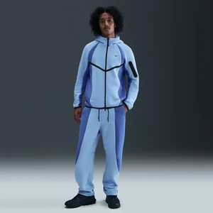 Męskie spodnie z dzianiny w kontrastowych kolorach z luźnymi nogawkami Nike Tech - Niebieski