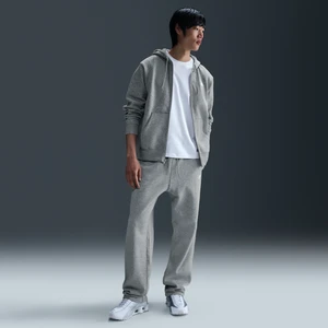 Męskie spodnie z dzianiny z luźnymi nogawkami Nike Club - Szary