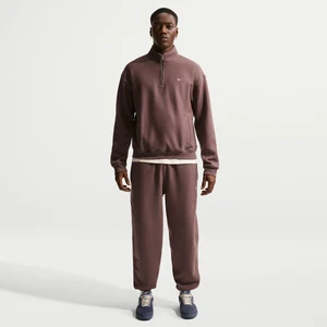 Męskie spodnie z dzianiny ze ściągaczami Nike Solo Swoosh - Fiolet