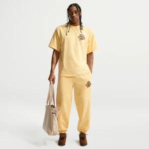 Męskie spodnie z dzianiny ze ściągaczami Nike Solo Swoosh - Żółty