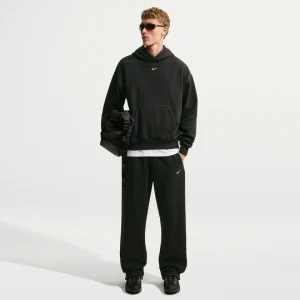 Męskie spodnie z elastycznym sznurkiem Nike Solo Fleece - Czerń