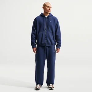 Męskie spodnie z elastycznym sznurkiem Nike Solo Fleece - Niebieski