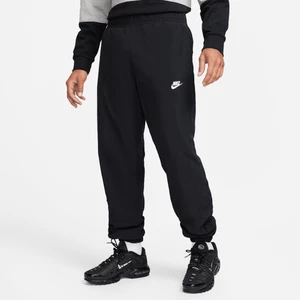 Męskie spodnie z tkaniny na zimę Nike Windrunner - Czerń