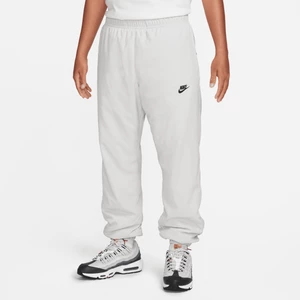 Męskie spodnie z tkaniny na zimę Nike Windrunner - Szary