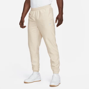 Męskie spodnie z tkaniny Nike Sportswear - Brązowy