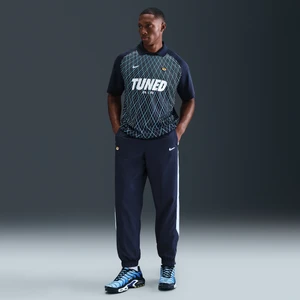 Męskie spodnie z tkaniny Nike Sportswear - Niebieski