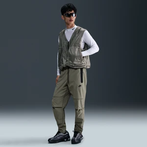 Męskie spodnie z tkaniny Nike Tech - Zieleń