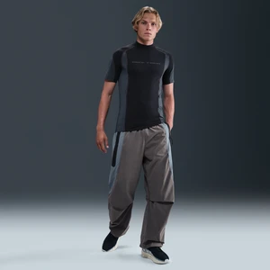 Męskie spodnie z tkaniny w kontrastowych kolorach o oversizowym kroju Dri-FIT Nike Tech - Szary
