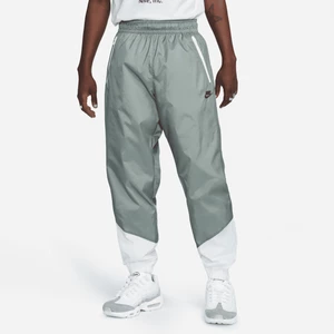 Męskie spodnie z tkaniny z podszewką Nike Windrunner - Szary