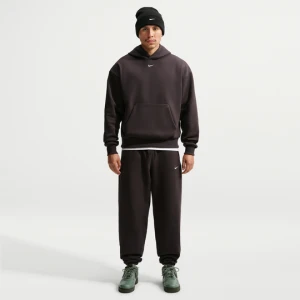 Męskie spodnie ze ściągaczem Nike Solo Fleece - Brązowy