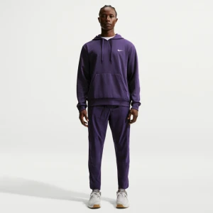 Męskie uniwersalne spodnie ze ściągaczami i zamkami Dri-FIT Nike Unlimited - Fiolet