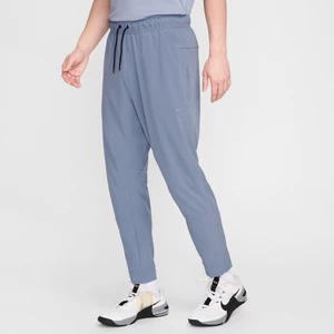 Męskie uniwersalne spodnie ze ściągaczami i zamkami Dri-FIT Nike Unlimited - Niebieski