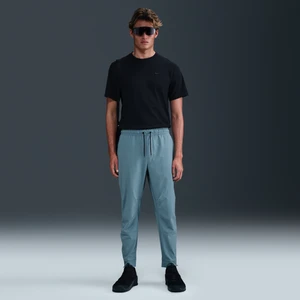 Męskie uniwersalne spodnie ze ściągaczami i zamkami Dri-FIT Nike Unlimited - Niebieski