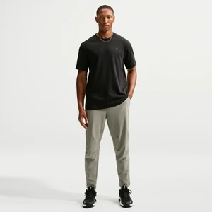 Męskie uniwersalne spodnie ze ściągaczami i zamkami Dri-FIT Nike Unlimited - Zieleń