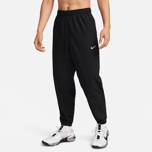 Męskie uniwersalne spodnie ze zwężanymi nogawkami Dri-FIT Nike Form - Czerń