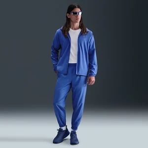 Męskie uniwersalne spodnie ze zwężanymi nogawkami Dri-FIT Nike Form - Niebieski