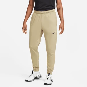 Męskie zwężane spodnie do fitnessu z dzianiny Dri-FIT Nike Dry - Brązowy