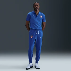 Męskie zwężane spodnie piłkarskie Nike Dri-FIT Atlético Madryt Standard Issue - Niebieski