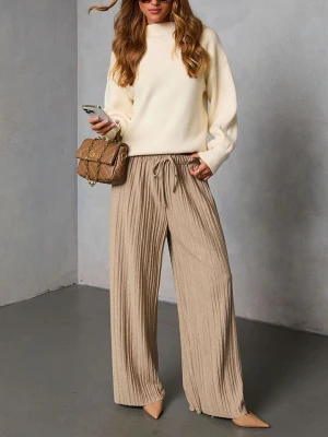 Milan Kiss Spodnie w kolorze beżowym rozmiar: XL