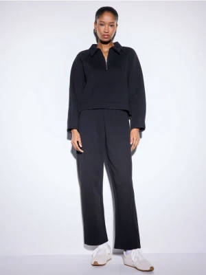 Mohito - Czarne spodnie dresowe - czarny