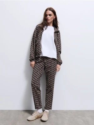 Mohito - Dresowe joggery w monogram - czarny