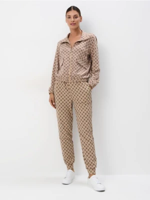 Mohito - Spodnie dresowe w monogram - beżowy