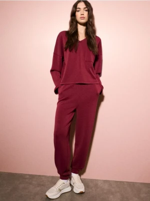 Mohito - Spodnie dresowe z dodatkiem modalu - czerwony