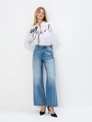 Mohito - Woskowane jeansy wide leg - niebieski