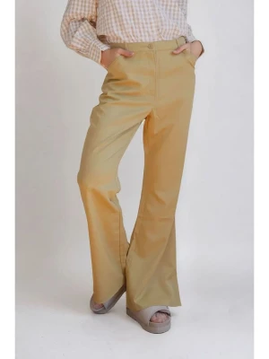 Monki Spodnie w kolorze żółtym rozmiar: 32