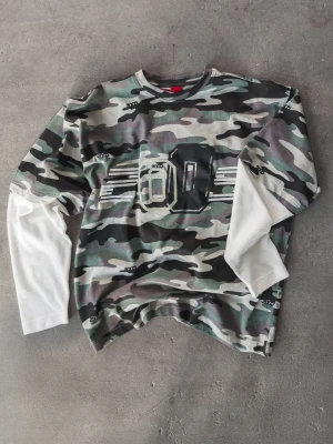 2005xReporter Camo longsleeve
