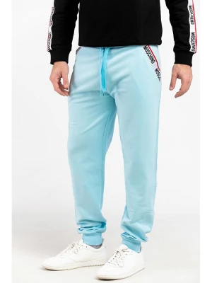 Moschino Spodnie dresowe w kolorze turkusowym rozmiar: M