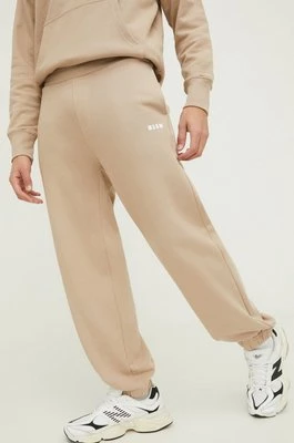 MSGM spodnie dresowe bawełniane kolor beżowy gładkie
