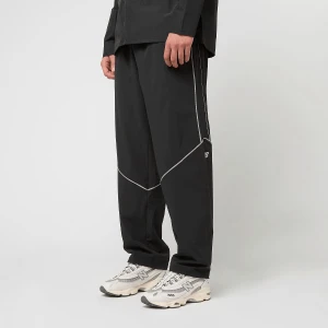 New Balance Active Reflective Woven Pants mężczyźni Spodnie dresowe czarny rozmiar Odzież