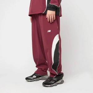 New Balance In Game Woven Trackpant mężczyźni Spodnie dresowe czerwony rozmiar Odzież