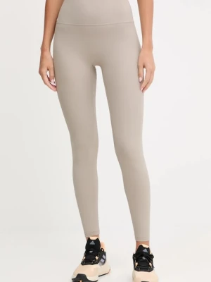 New Balance legginsy treningowe damskie kolor beżowy gładkie WP53152ADS