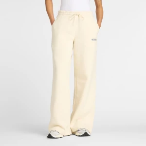 New Balance Reimagined Fleece Wide Leg Pants kobiety Spodnie dresowe beż rozmiar Odzież