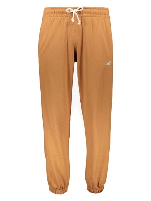 New Balance Spodnie dresowe "Athletics Remastered" w kolorze jasnobrązowym rozmiar: S