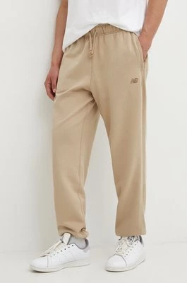 New Balance spodnie dresowe bawełniane MP41508SOT kolor beżowy gładkie