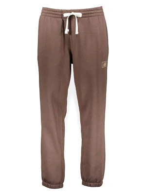 New Balance Spodnie dresowe "Essentials Brushed" w kolorze jasnobrązowym rozmiar: XL