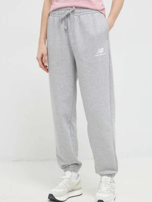 New Balance spodnie dresowe kolor szary gładkie