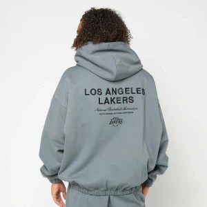 New Era NBA Linear Oversized Zt Hoodie Los Angeles Lakers mężczyźni Bluzy niebieski rozmiar Odzież