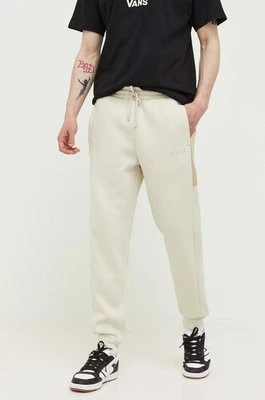 Nicce spodnie dresowe kolor beżowy z nadrukiem