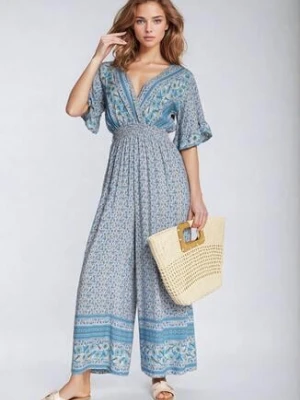 Niebieski Bawełniany Kombinezon z Gumkami w Pasie i Kopertowym Dekoltem Zapinany z Tyłu na Guziki Lorrania defox