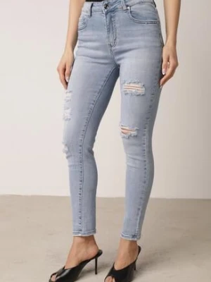 Niebieskie Bawełniane Jeansy o Kroju Slim z Przetarciami Elledima